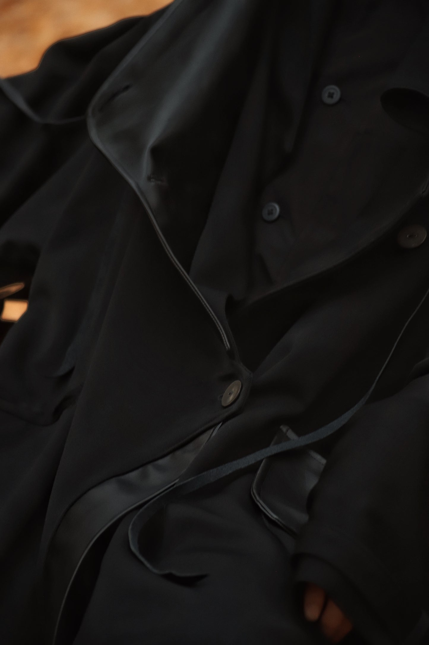 wool × leather layered coat