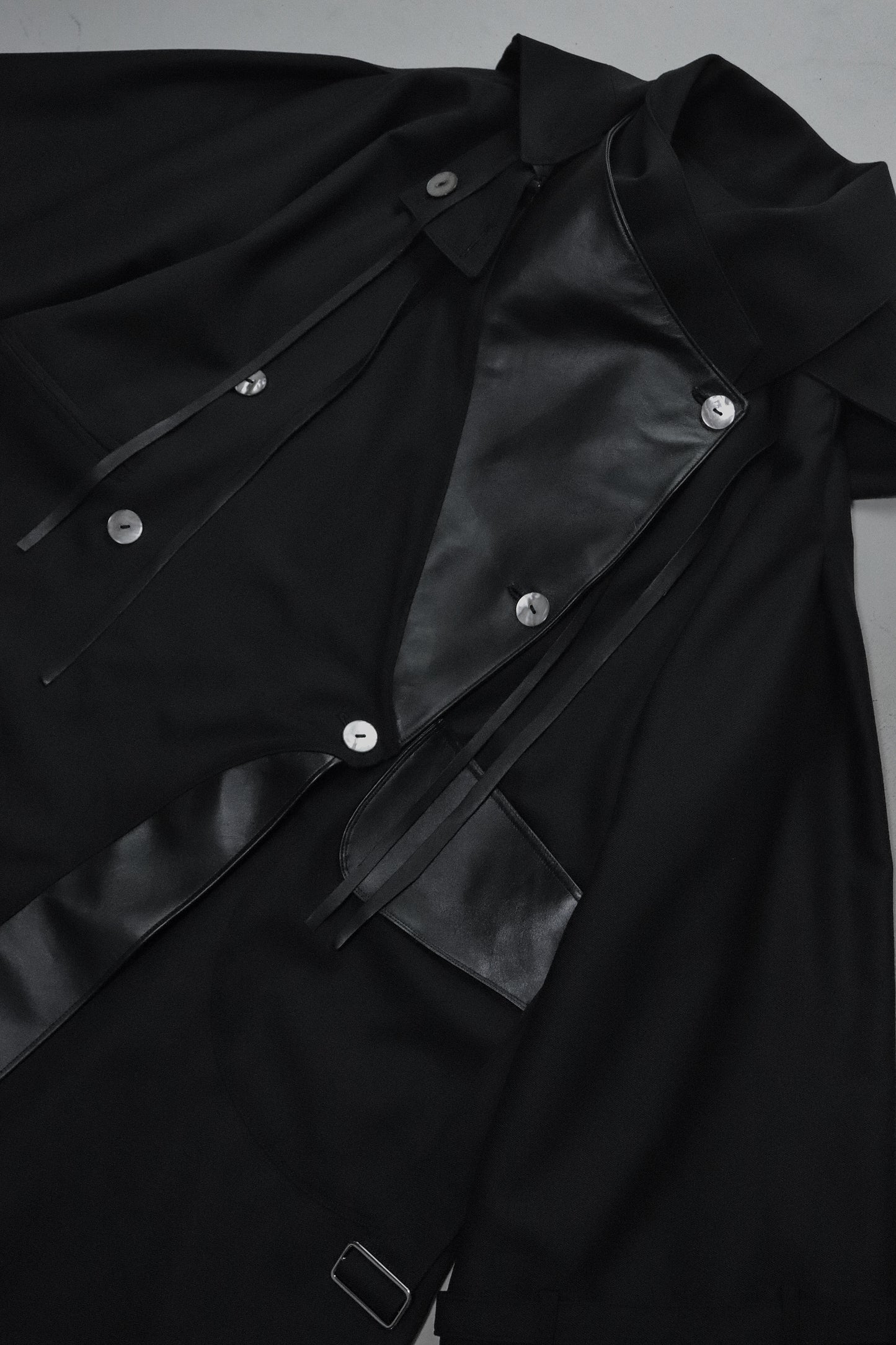 wool × leather layered coat