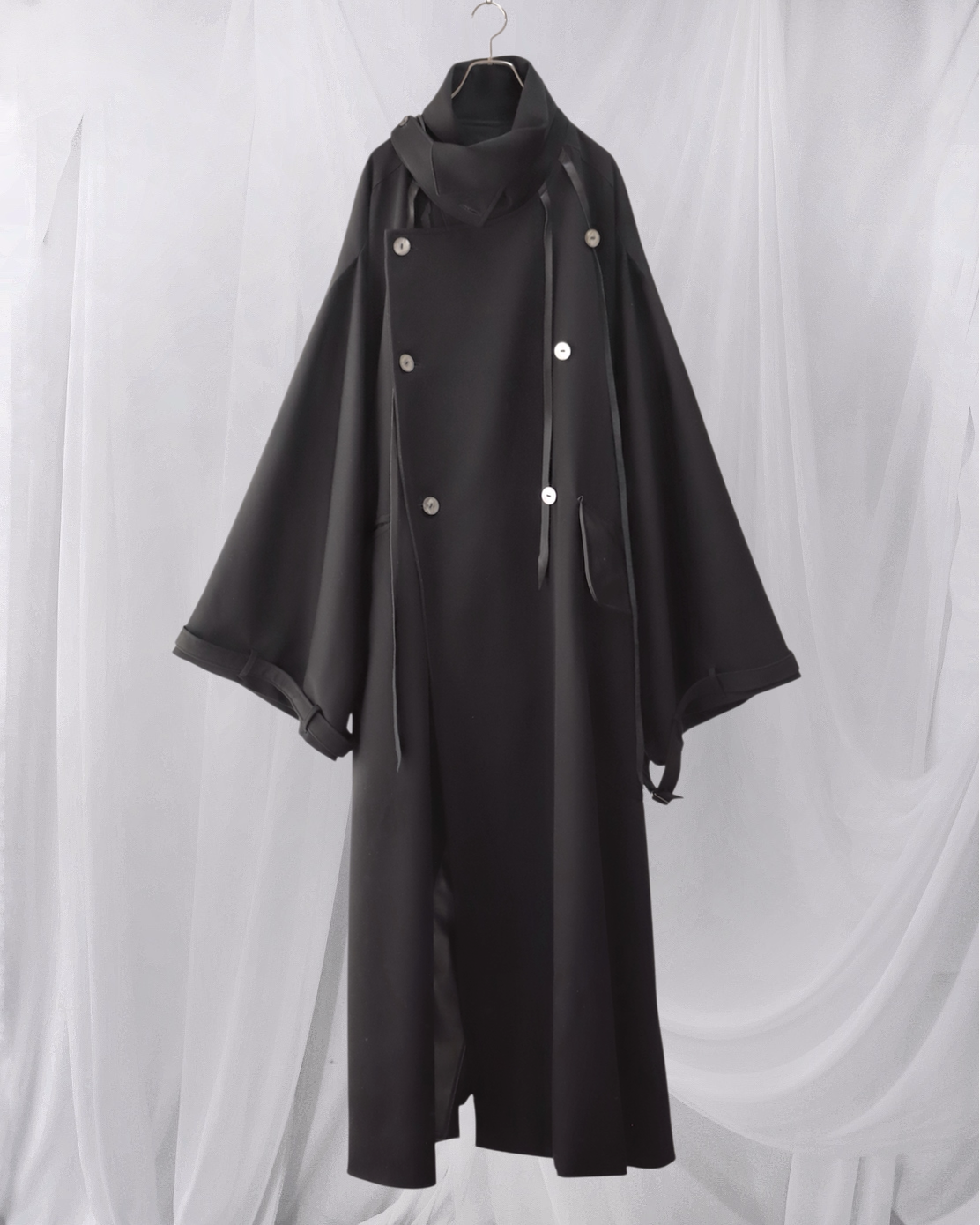 wool × leather layered coat