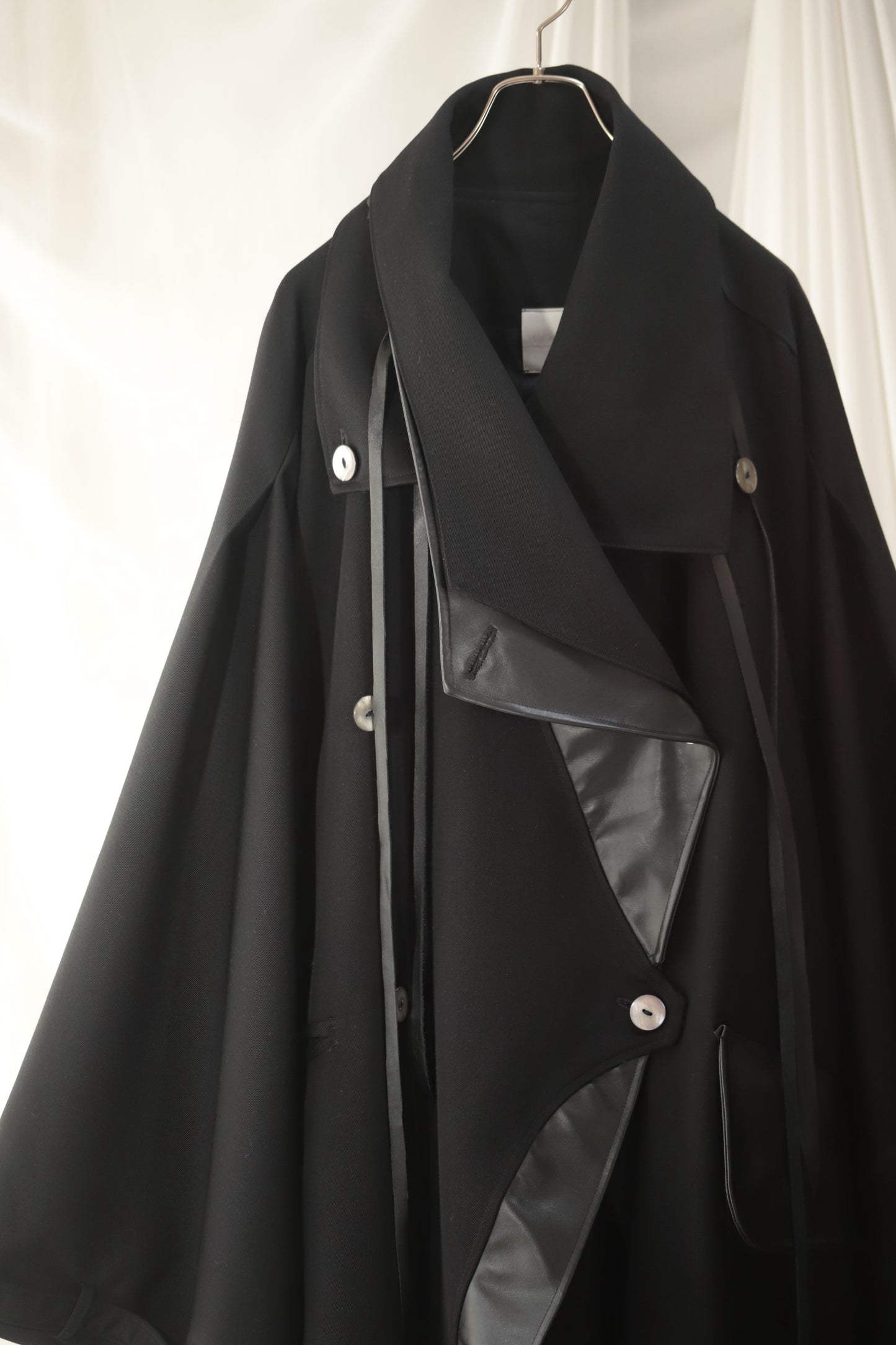 wool × leather layered coat