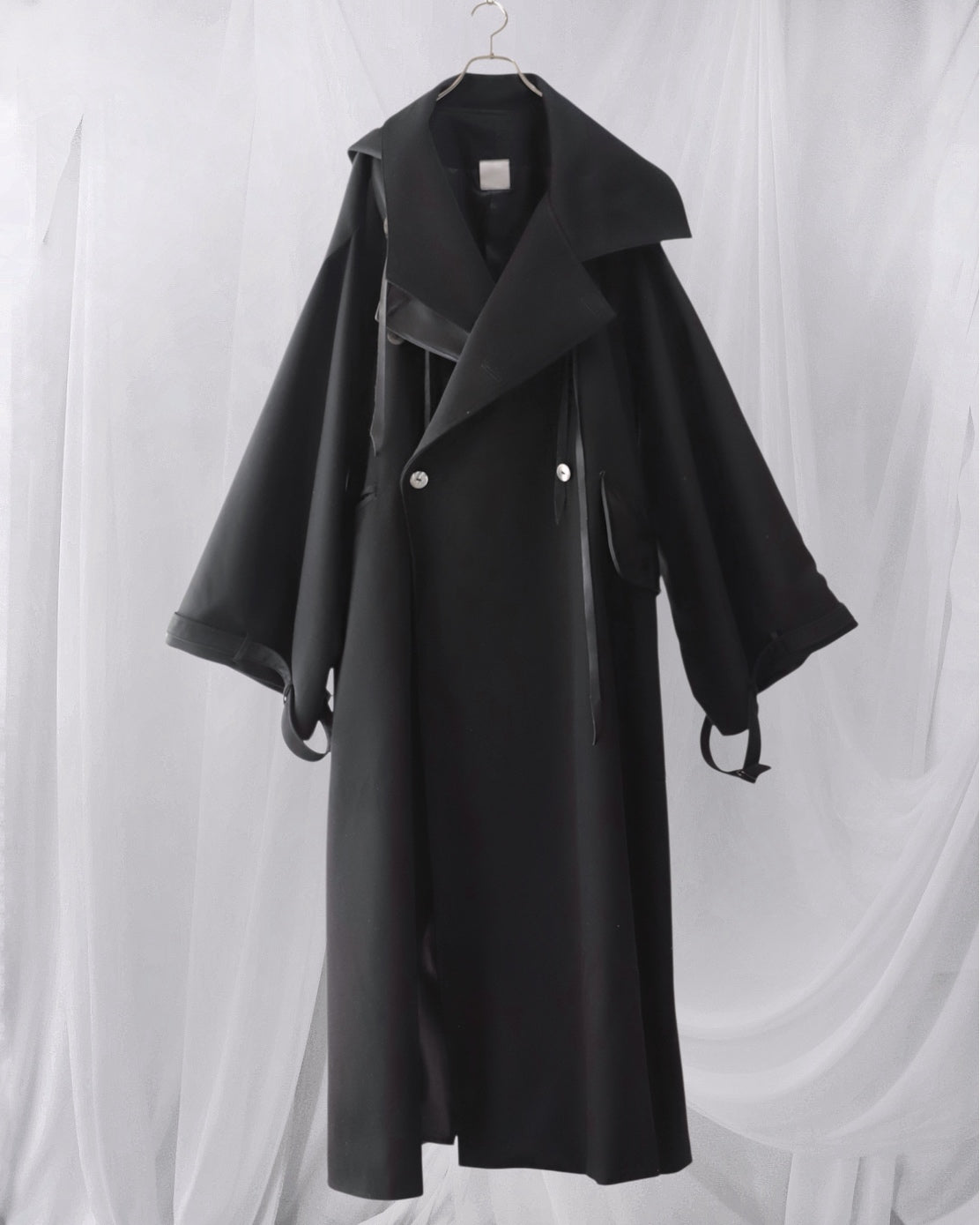 wool × leather layered coat