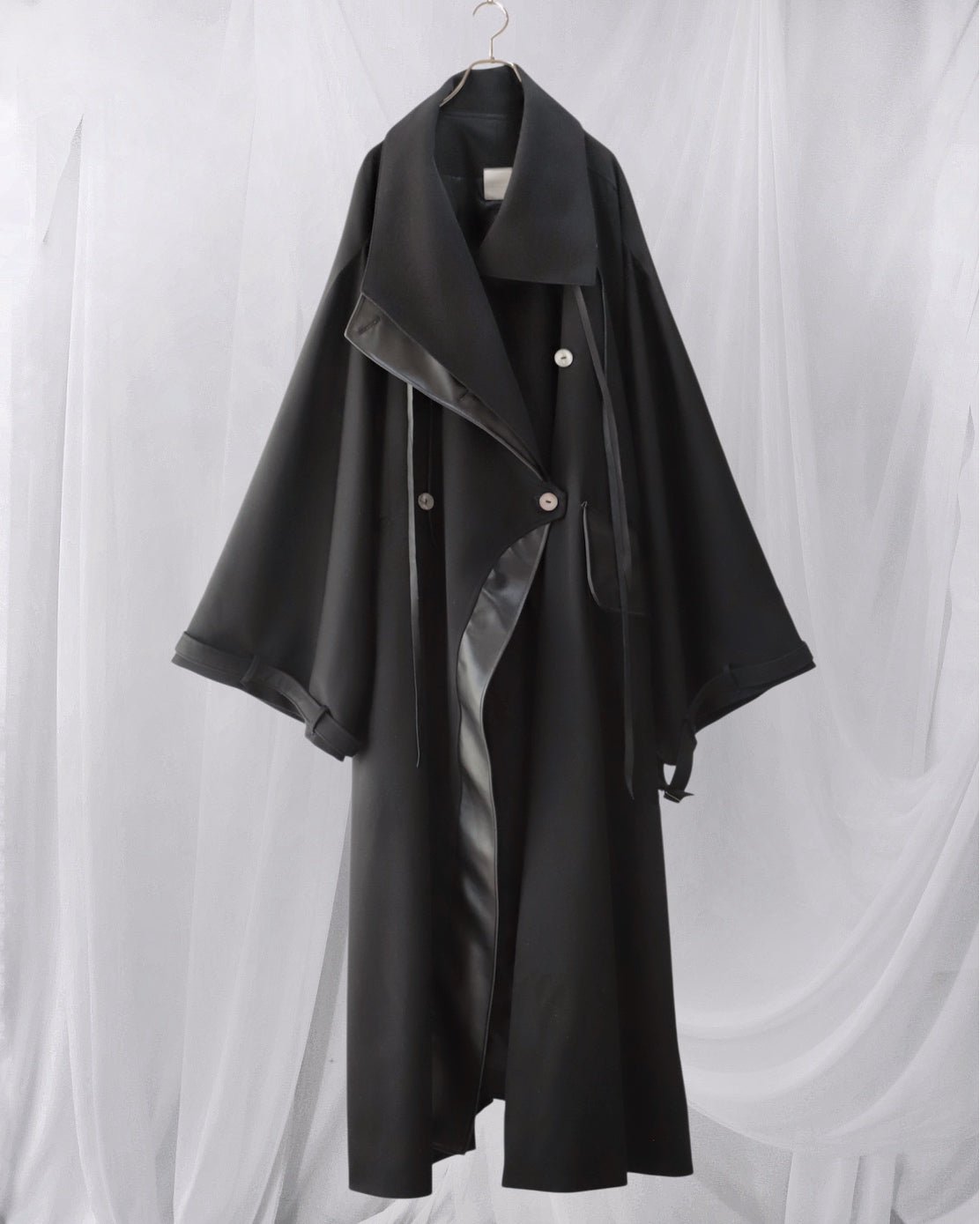 wool × leather layered coat