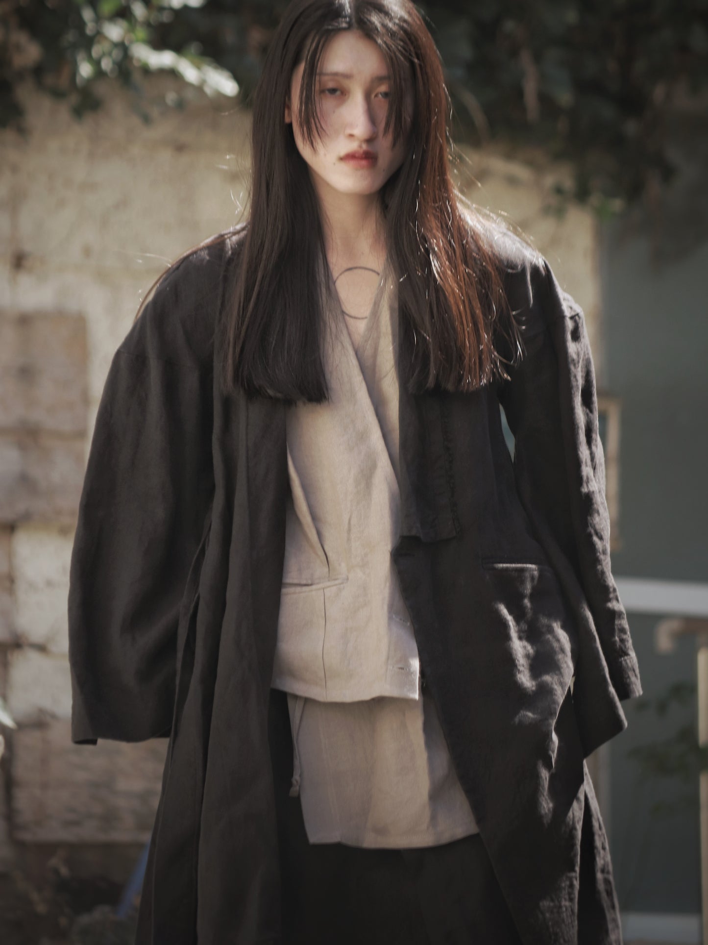 wide shoulder knee-length coat