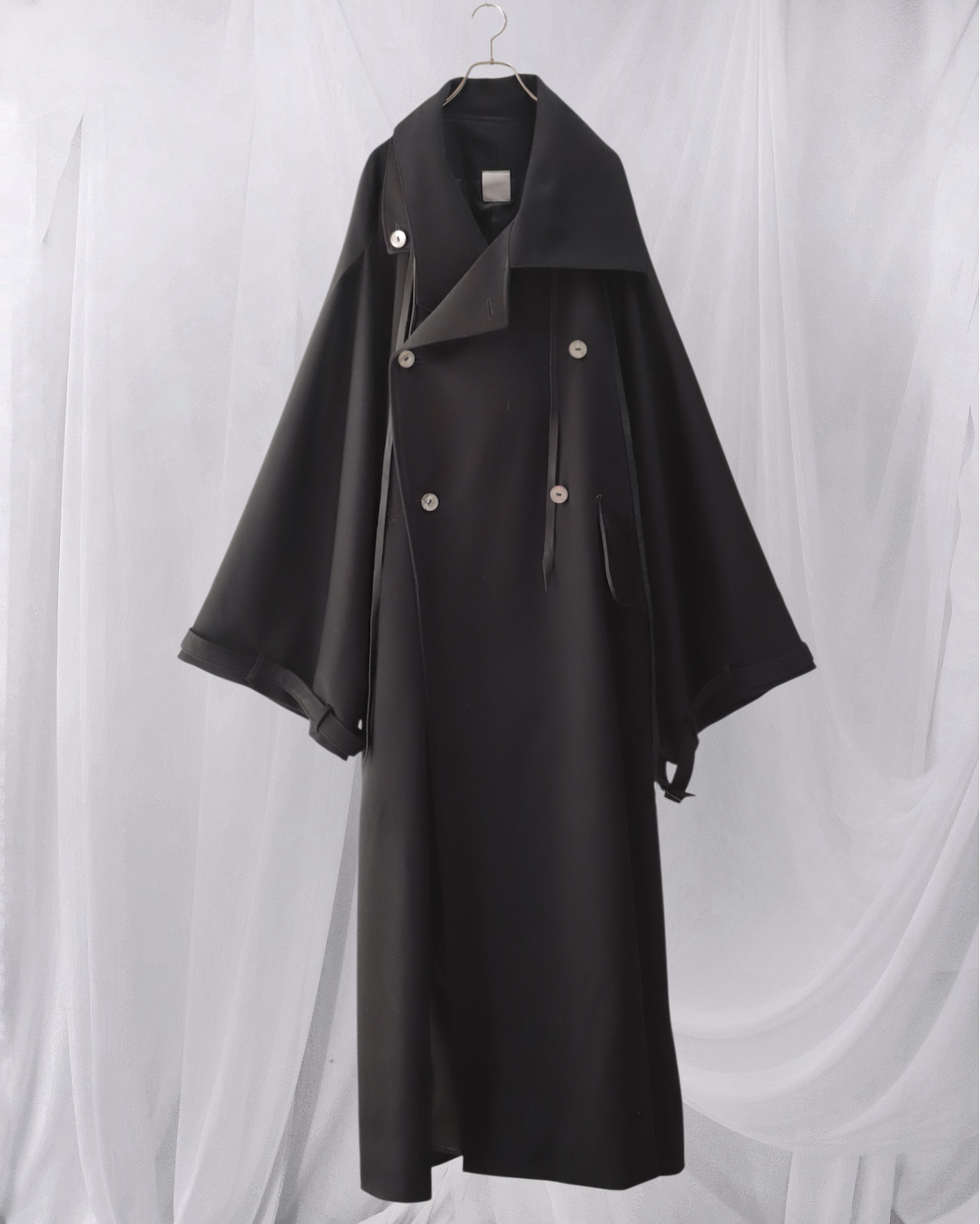 wool × leather layered coat