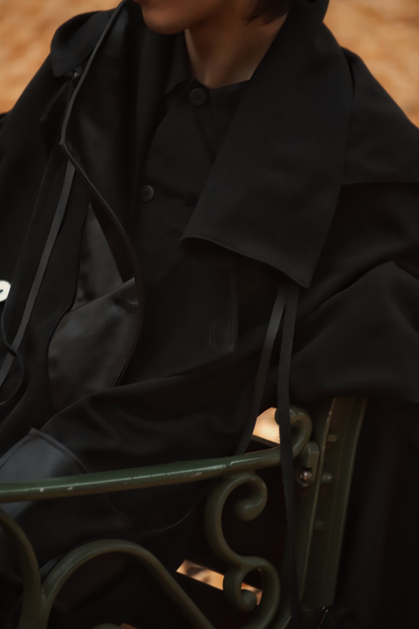 wool × leather layered coat