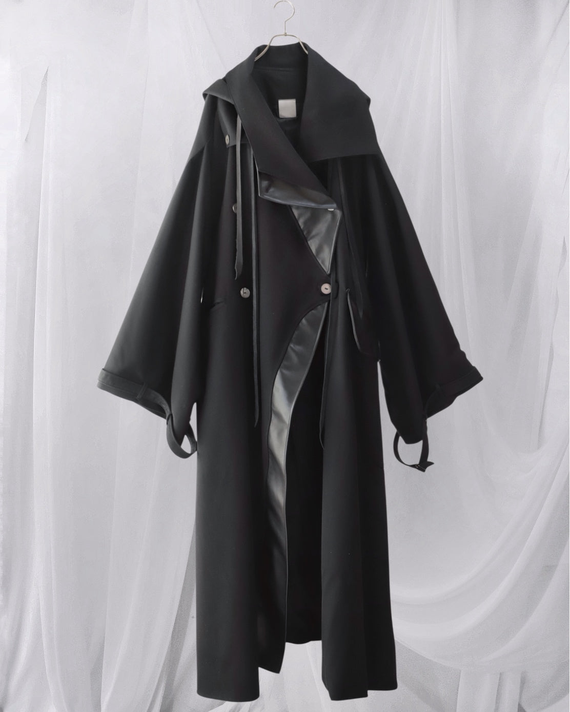 wool × leather layered coat