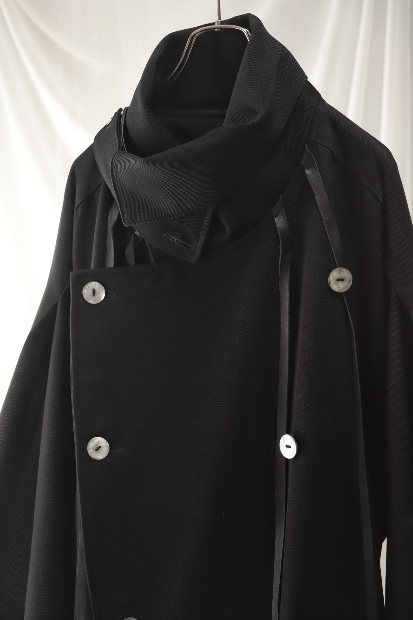 wool × leather layered coat