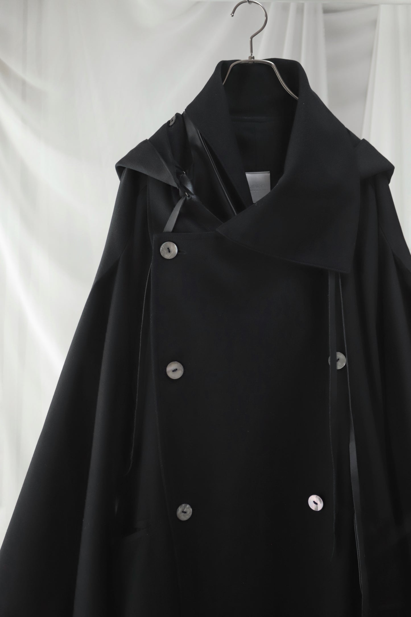 wool × leather layered coat