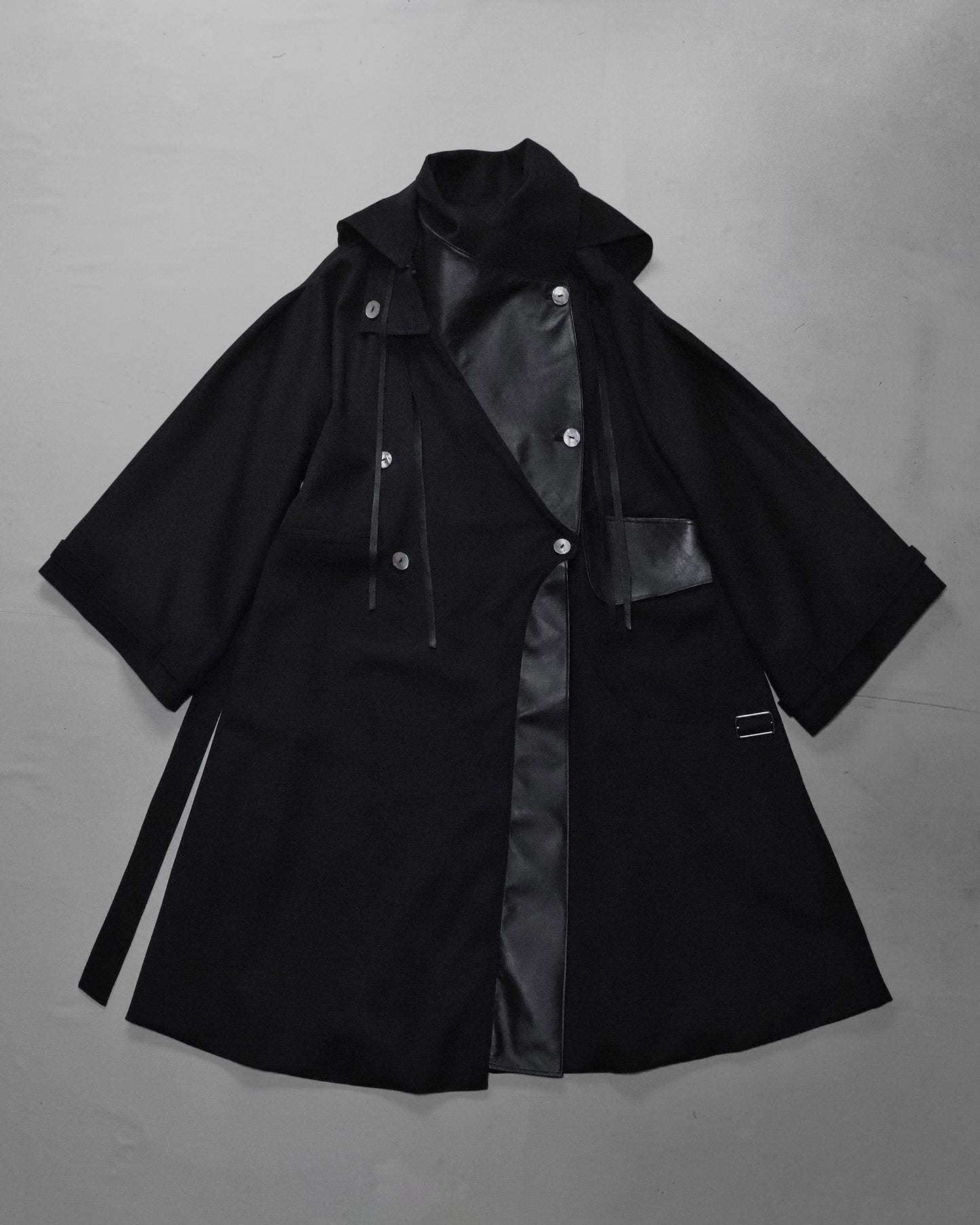 wool × leather layered coat