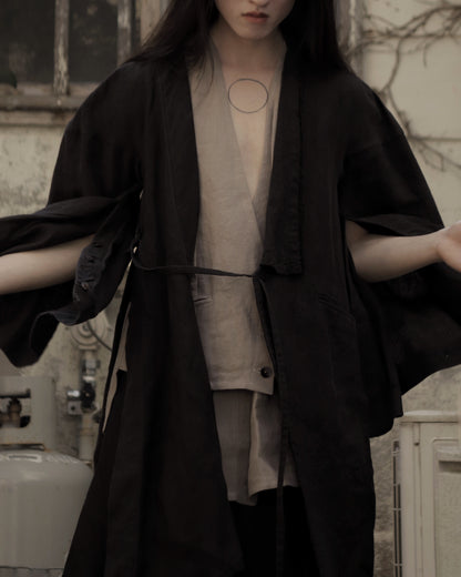 wide shoulder knee-length coat