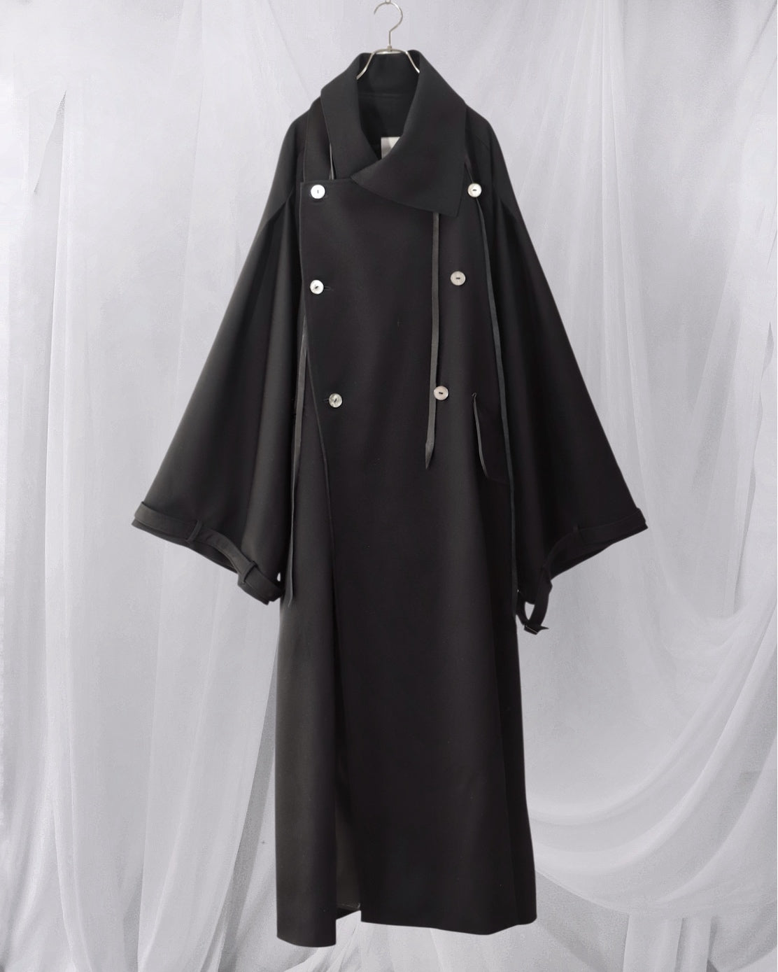 wool × leather layered coat