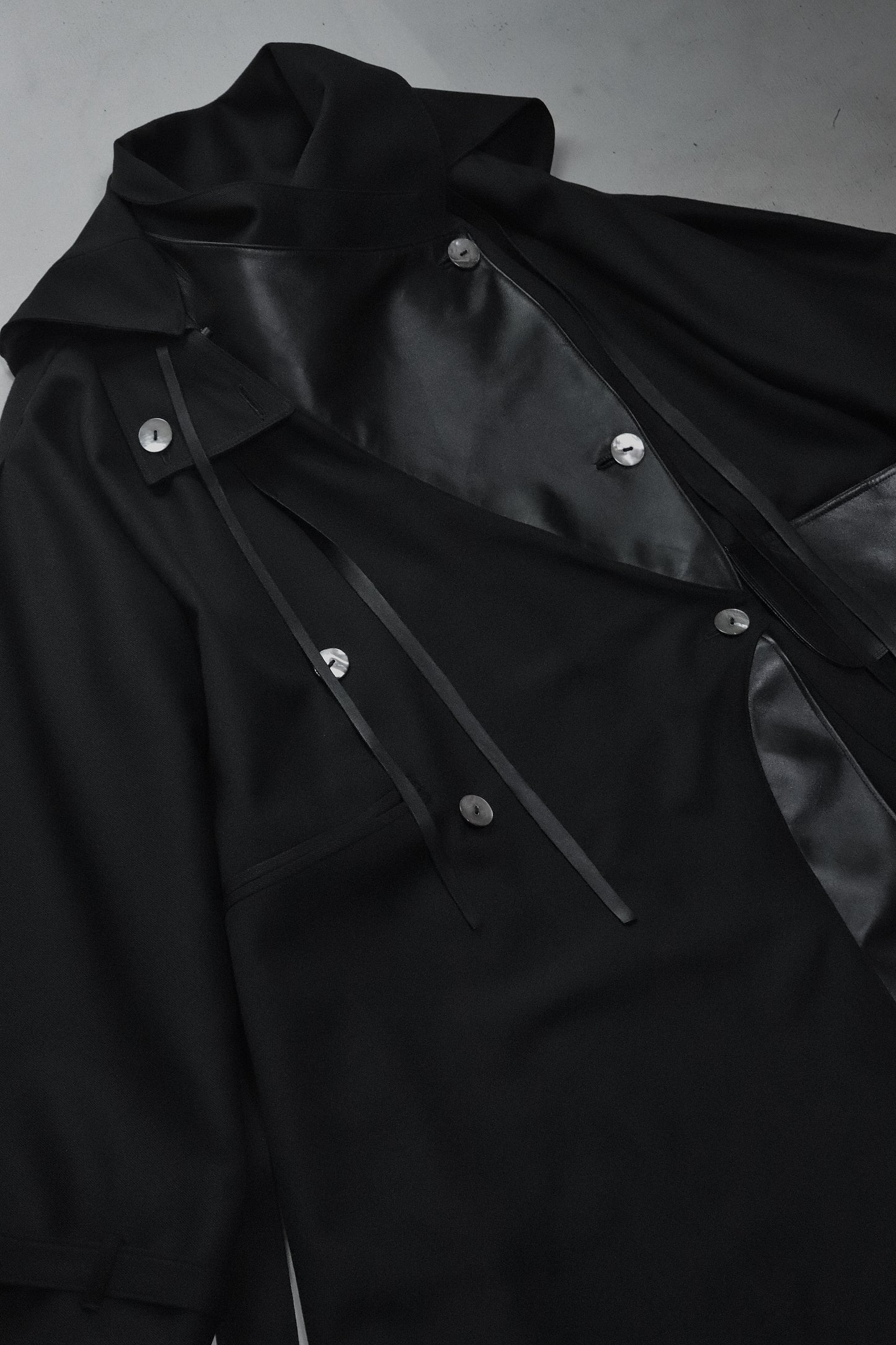 wool × leather layered coat