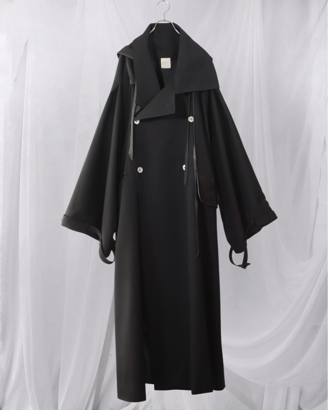 wool × leather layered coat