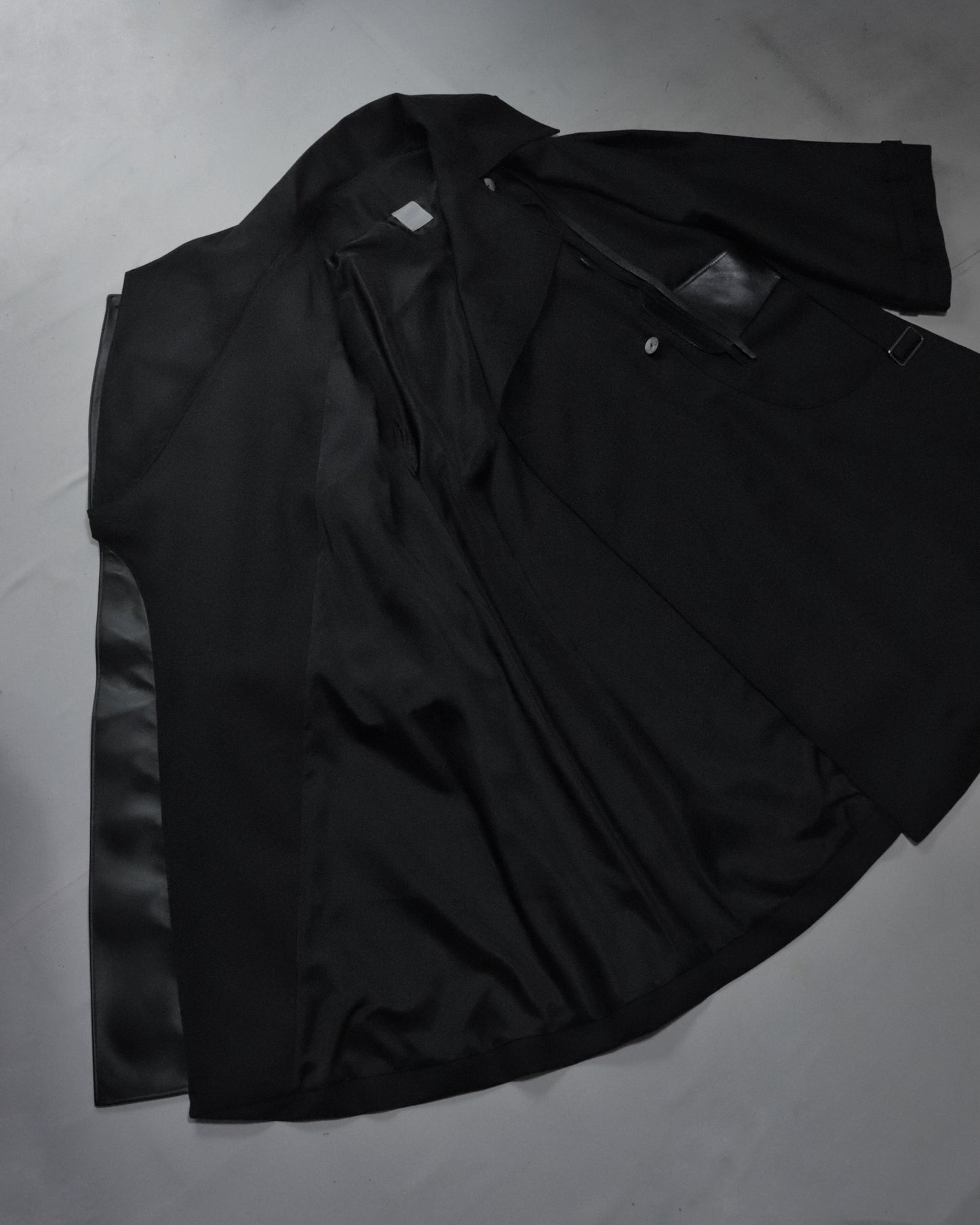 wool × leather layered coat