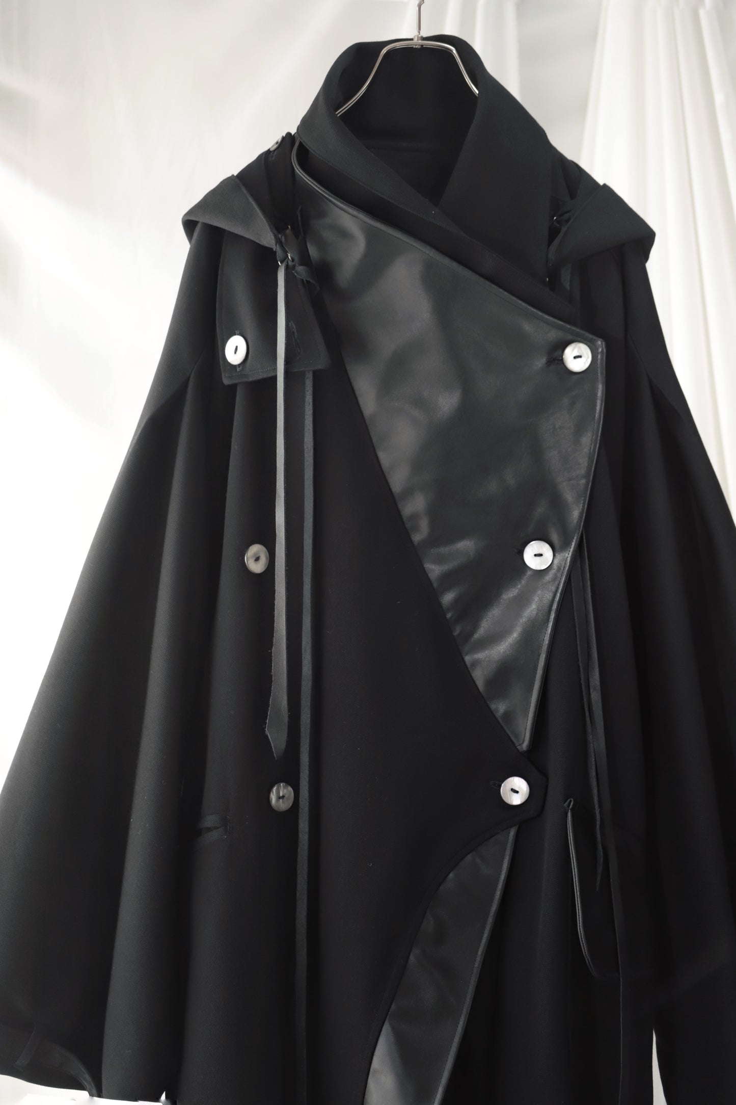 wool × leather layered coat