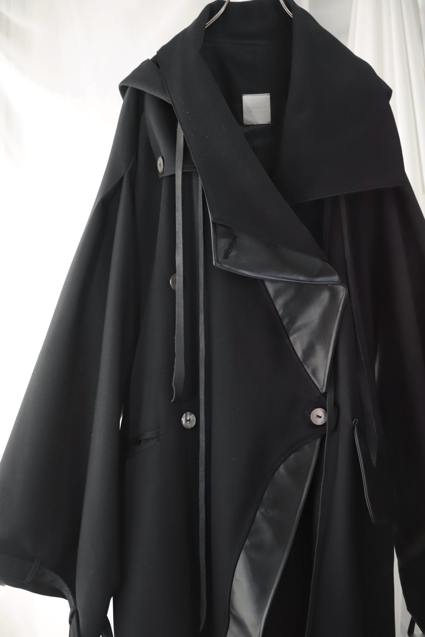 wool × leather layered coat