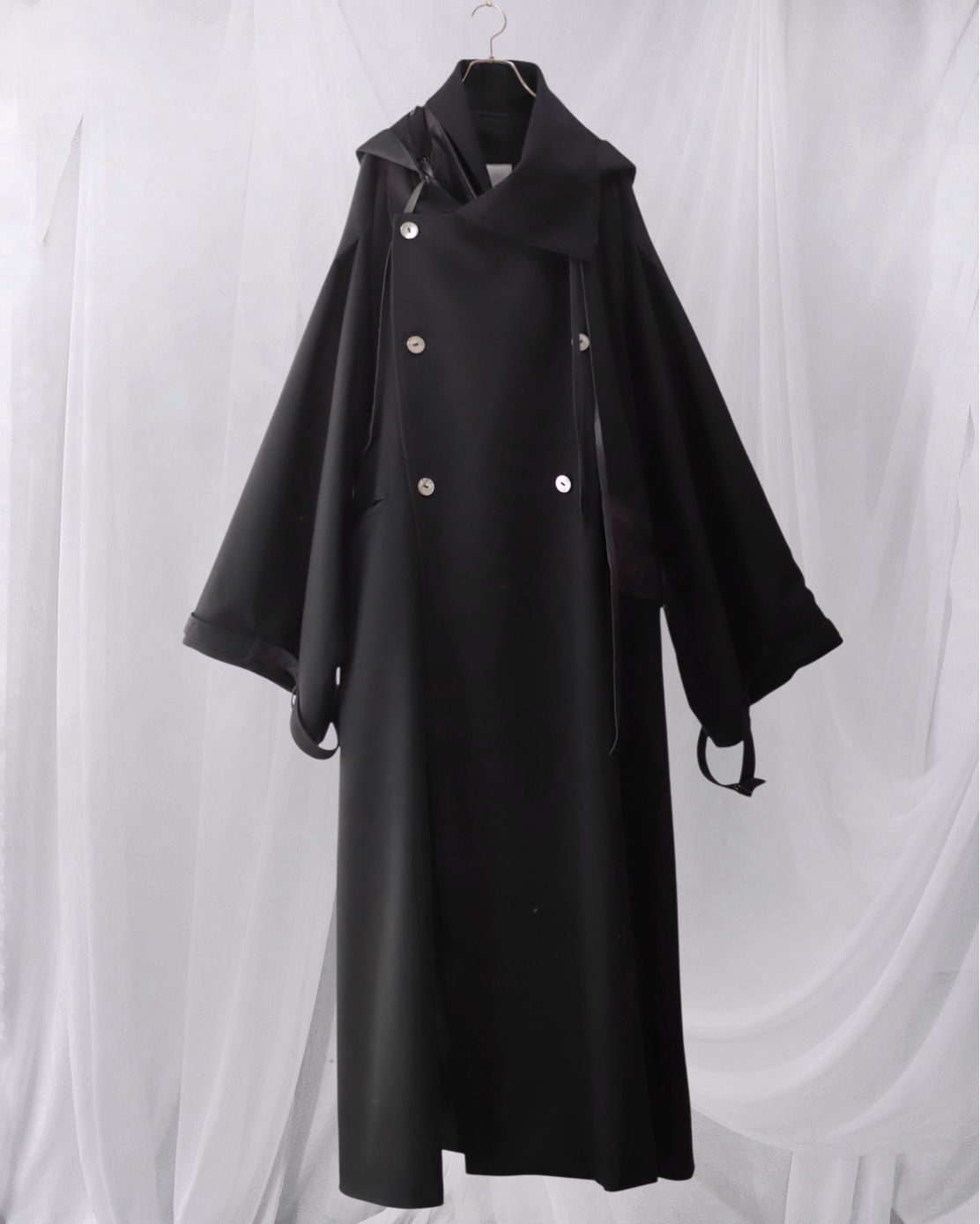 wool × leather layered coat