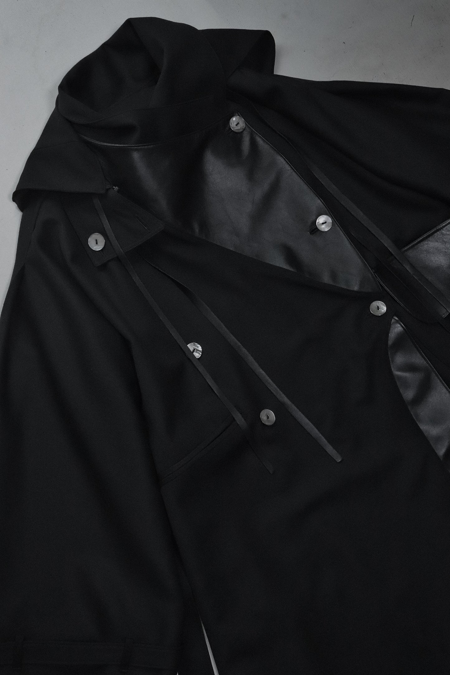 wool × leather layered coat