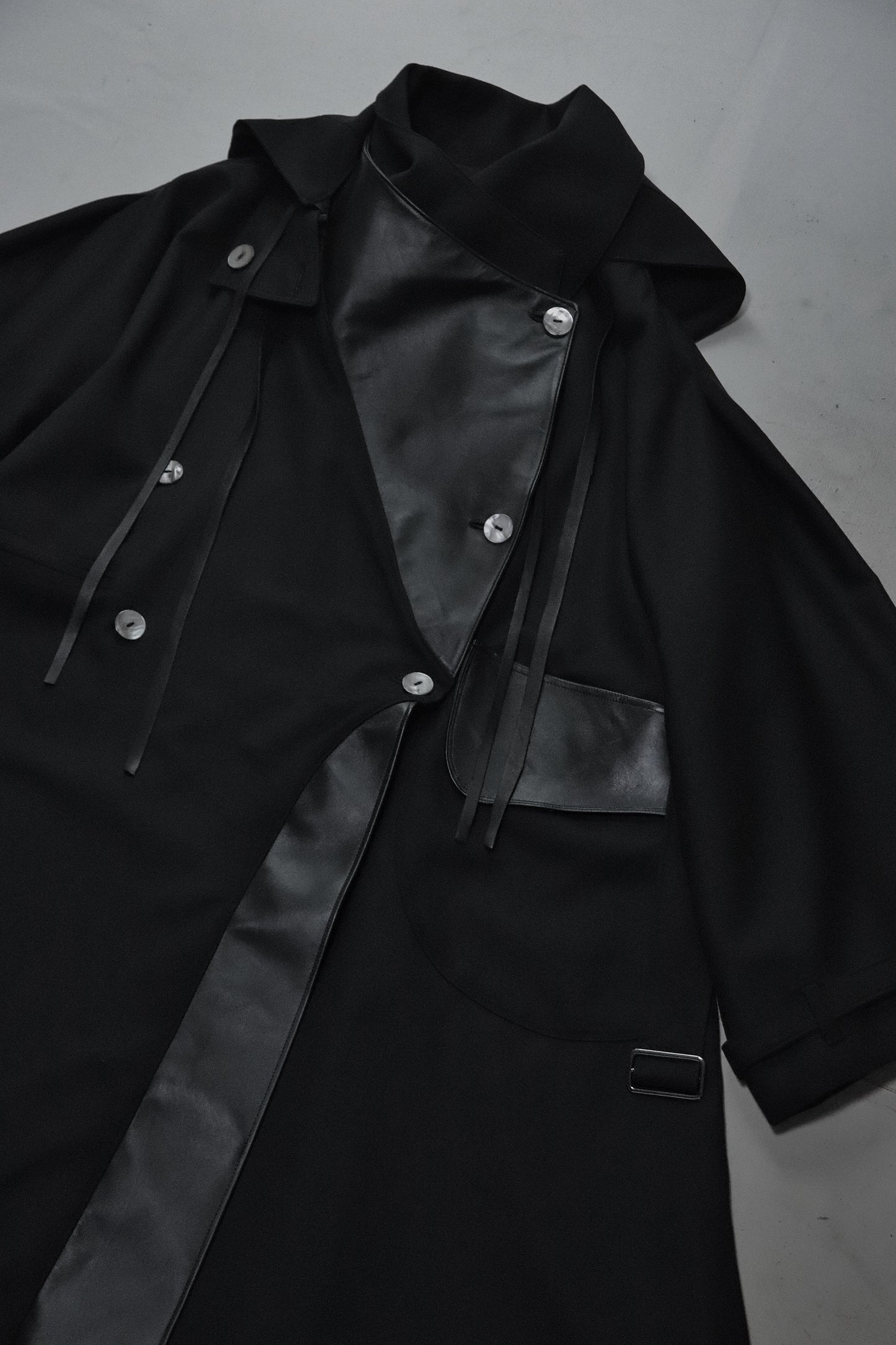 wool × leather layered coat